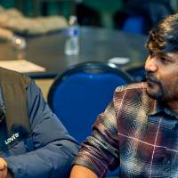 International Anchor Allies Winter 2026 First Mixer - A crew member smiling whiles Captain makes a point